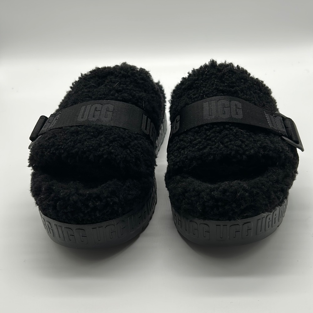 UGG SLIPPERS BLACK- worn 2 times in the house,did an ankle twister so I put away
